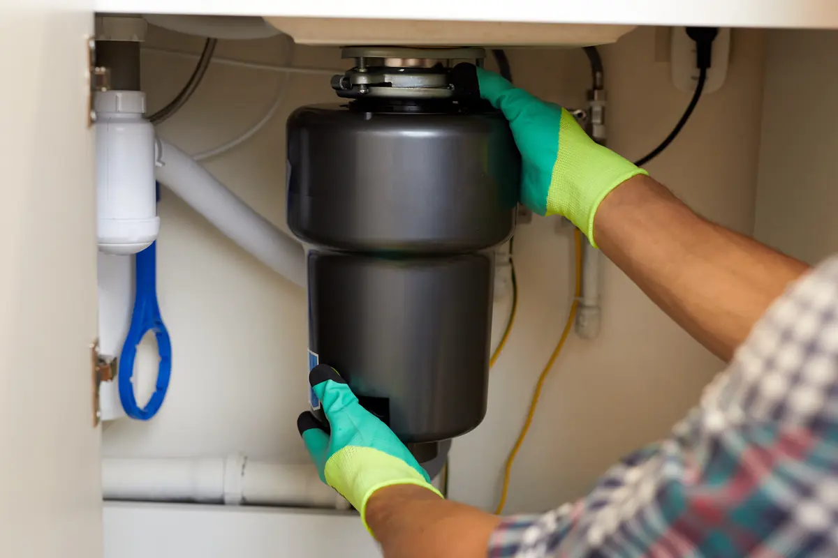 Installing a garbage disposal under a kitchen sink